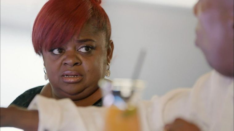 Juicy talks to Gary at the bar