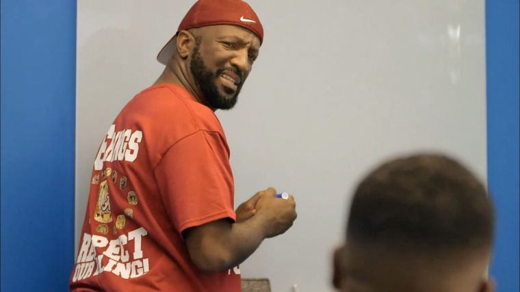 Rickey Smiley looks back at Gary because he said something crazy
