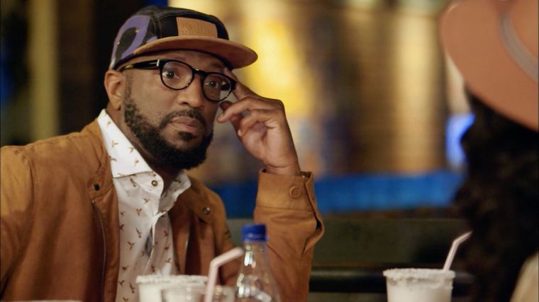 Rickey Smiley listens to his children as they discuss his love life.