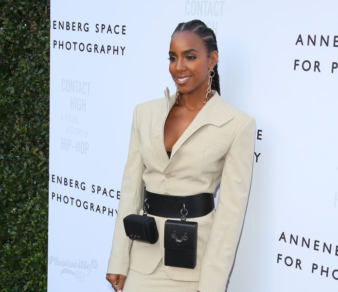 Kelly Rowland In A Fanny Pack And Sneakers
