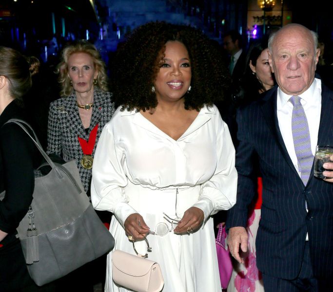 Oprah Winfrey Keeps It Cute And Flirty In This White Dress And Boots Combo
