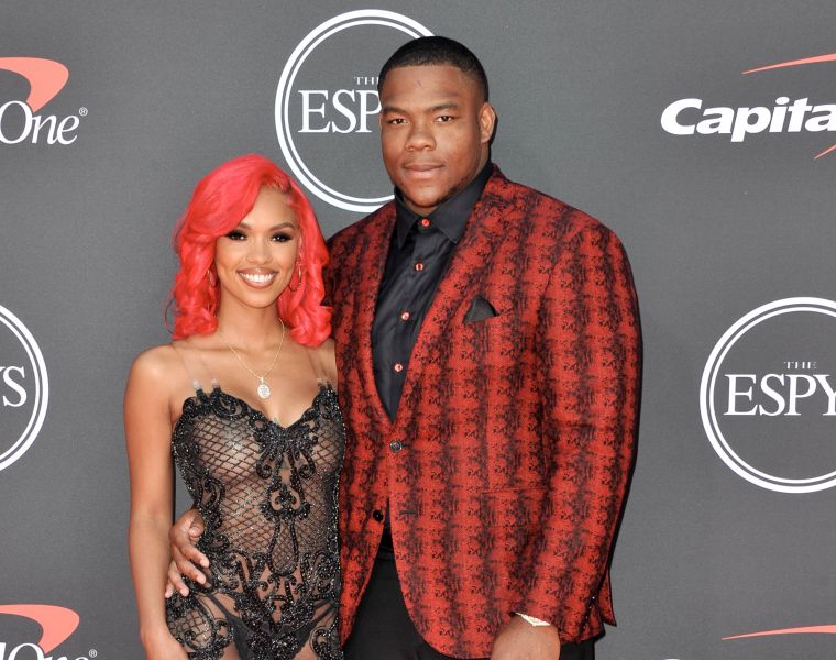 Yaunna Taylor and Daron Payne