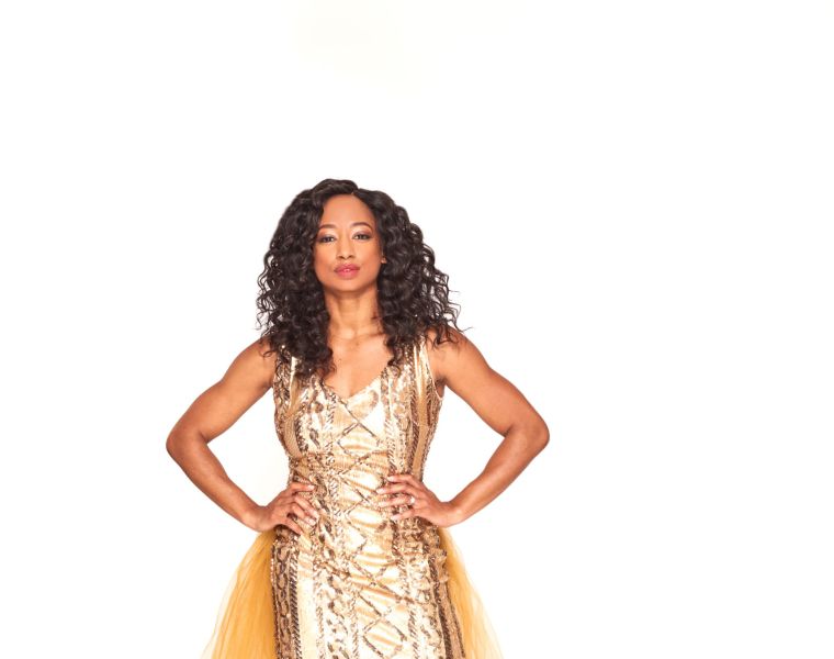 Monique Coleman as April