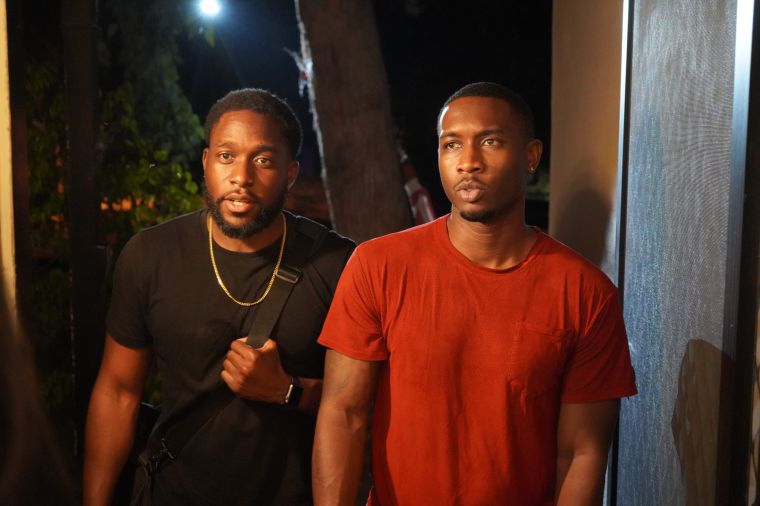 Javon Terrell (right) as Raymond