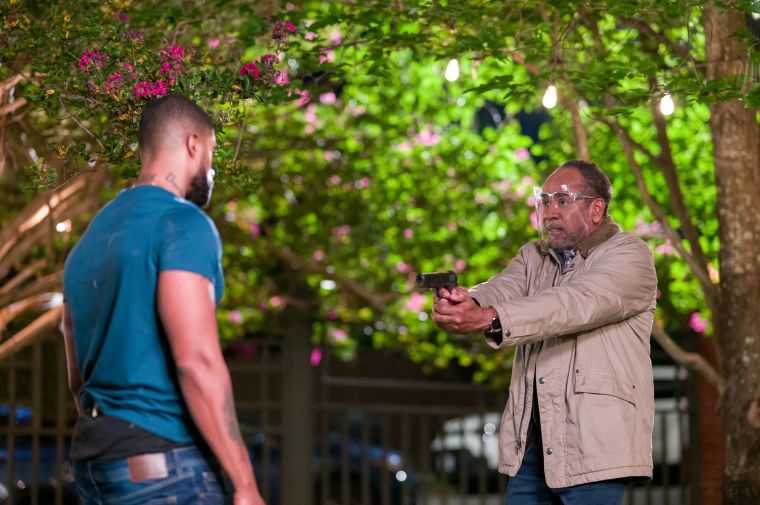 Skyh Black and Tim Reid mid scene on the set of Stranger Next Door