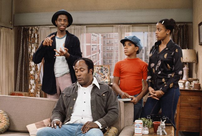 LOS ANGELES - JANUARY 25: GOOD TIMES cast members (from left) Jimmie Walker (as 'J.J.'), John Amos (as James Evans), Ralph Carter (as Michael Evans) and BernNadette Stanis (as Thelma Evans) . 1975. (Photo by CBS via Getty Images)