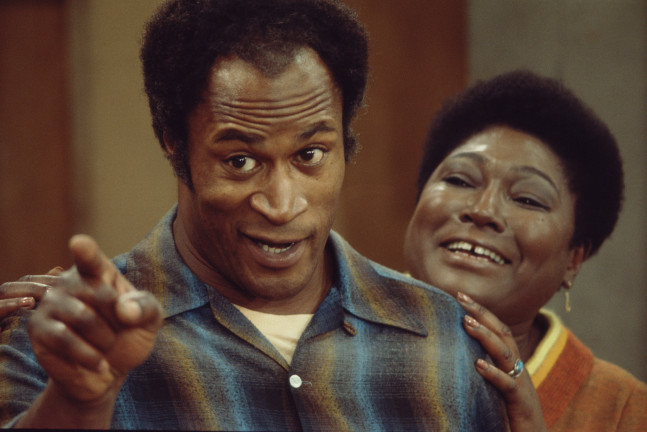 American actors John Amos and Esther Rolle (1920 - 1998) in a scene from the television show 'Good Times,' Los Angeles, California, 1975. (Photo by CBS Photo Archive/Getty Images)
